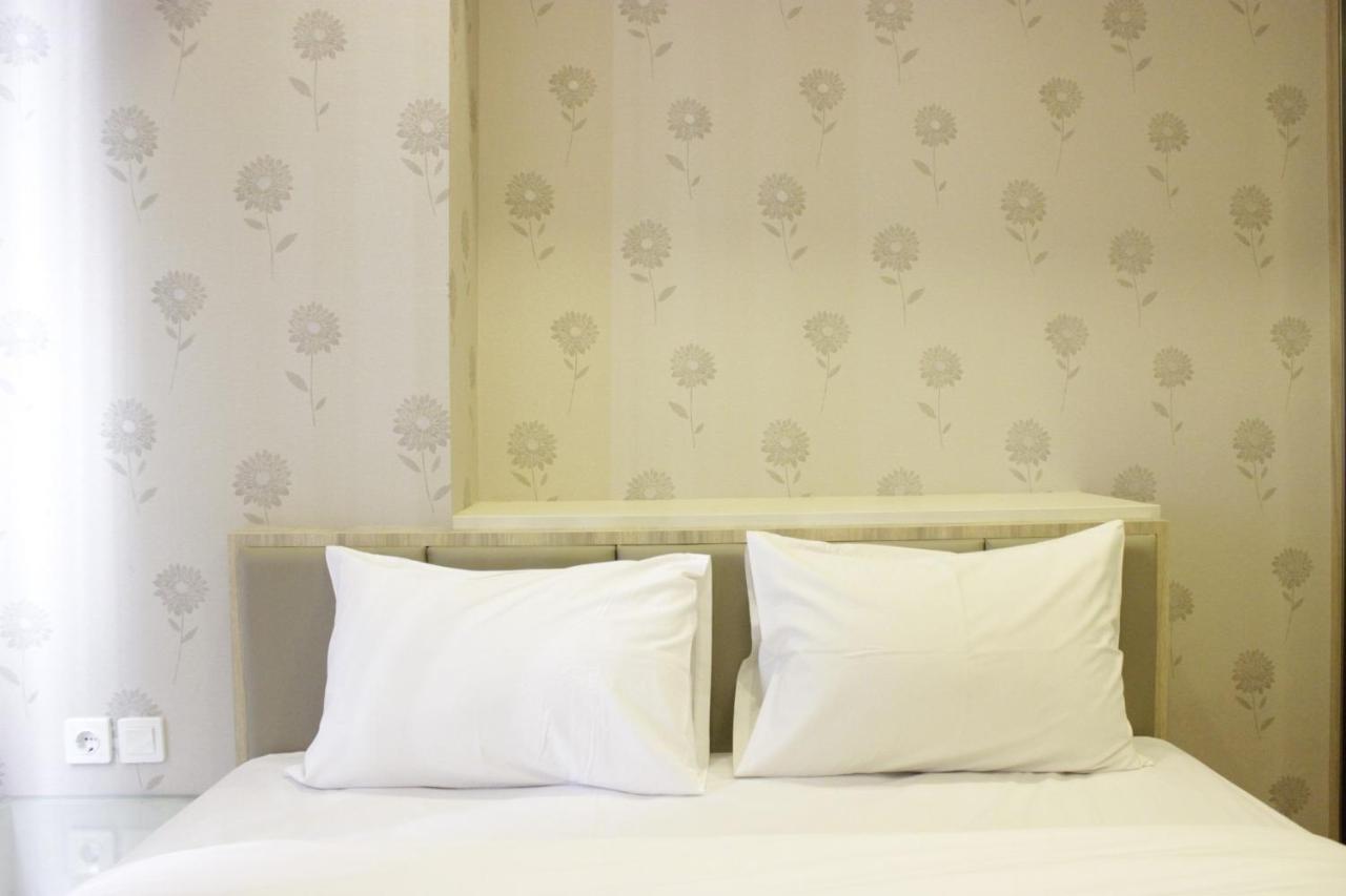 Homey And Chic 2br Newton By Travelio Apartemen